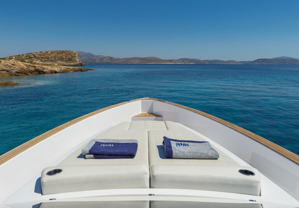 Luxury Pardo 38 yacht Wai cruising through the turquoise waters of the Cyclades, Greece.