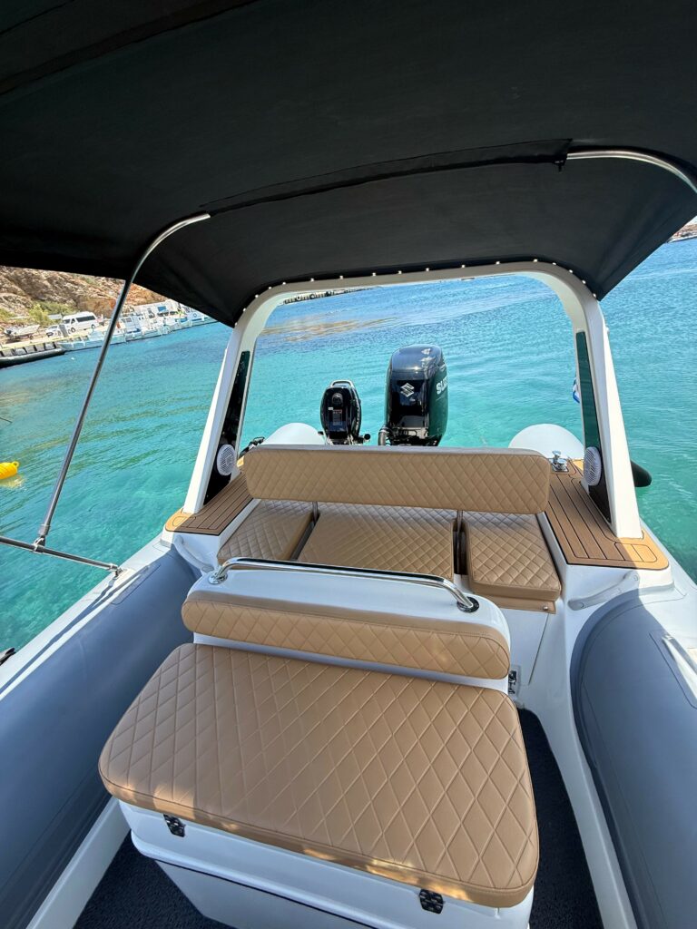 A La Mer Azur — boat rental in Sifnos, convertible aft seating and sunbed over turquoise water