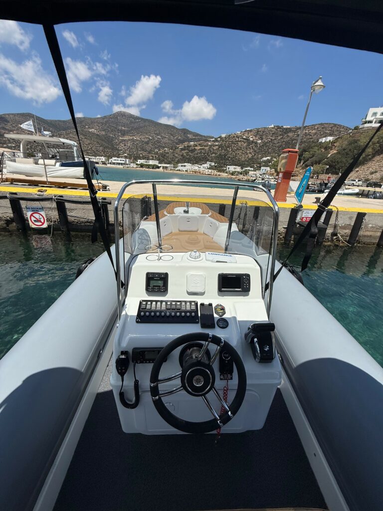 A La Mer Azur — boat rental in Sifnos, full helm station with steering wheel, electronics and open deck